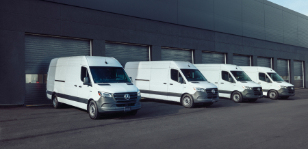 two vans at the Mercedes-Benz Dealership that has the text "Fleets 5-25" over it.